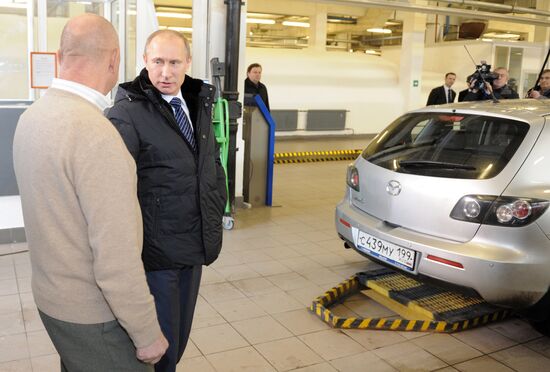 Посещение В. Путиным пункта техосмотра автотранспорта в Москве