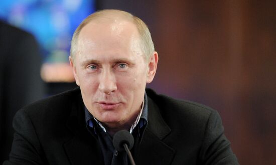 Кандидат в президенты РФ В.Путин посещает избирательный штаб