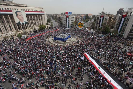 Митинг в поддержку действующей власти в Сирии