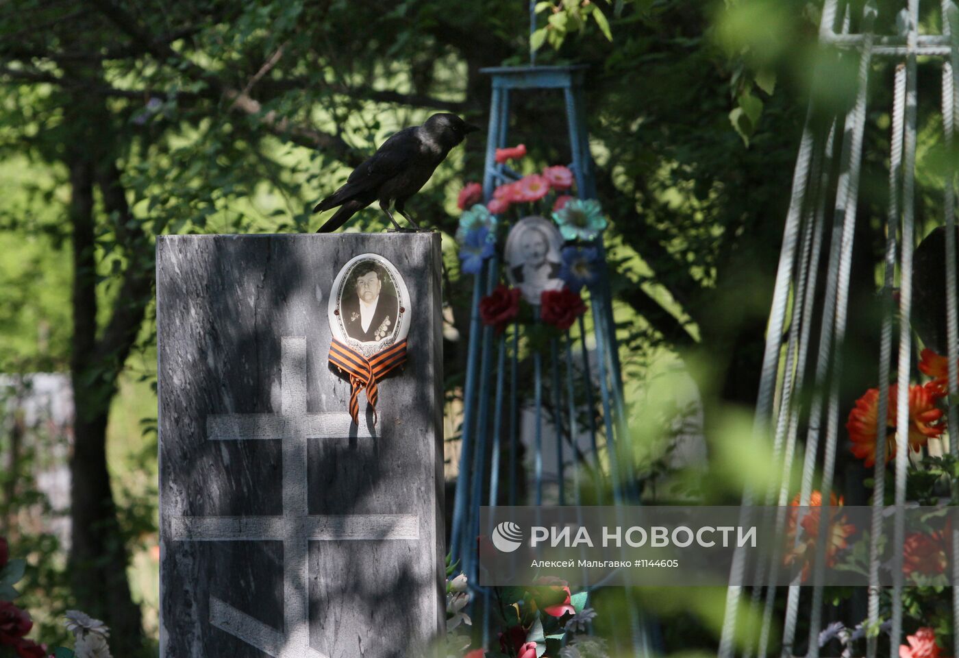 Посещение кладбища в день праздника святой Троицы