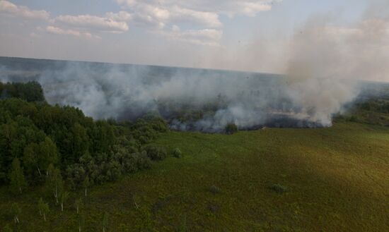 Тушение лесных пожаров в Томской области