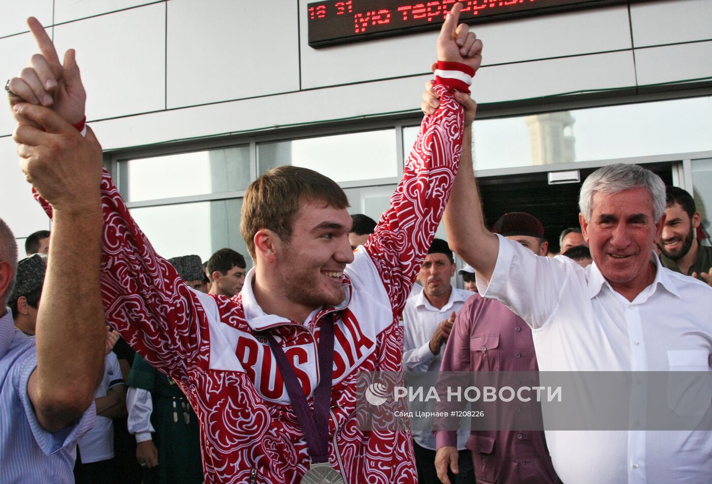 Встреча серебряного призера ОИ штангиста А.Аухадова в Грозном