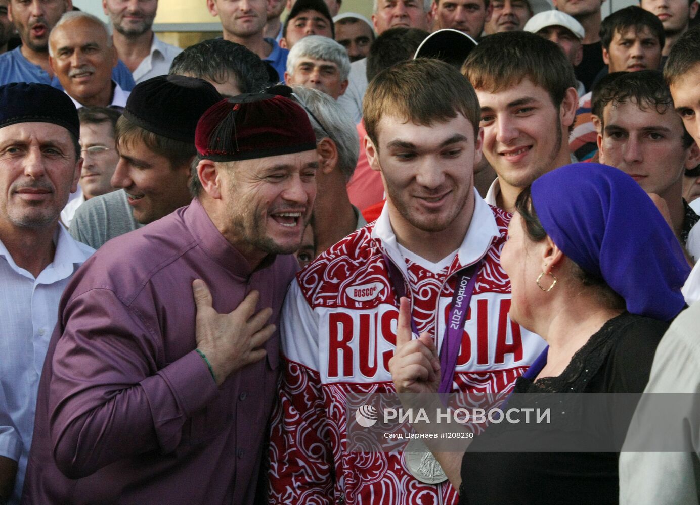 Встреча серебряного призера ОИ штангиста А.Аухадова в Грозном