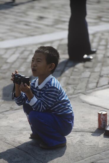 Юный фотограф