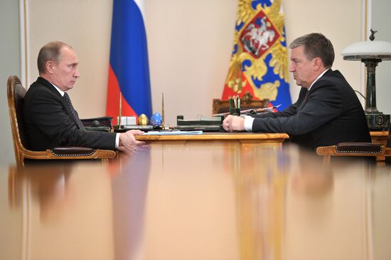 В.Путин встретился с А.Худилайненом