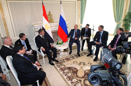 В. Путин встретился с М. Мурси