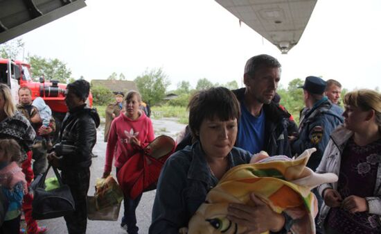 Эвакуация жителей из зоны подтопления в Амурской области