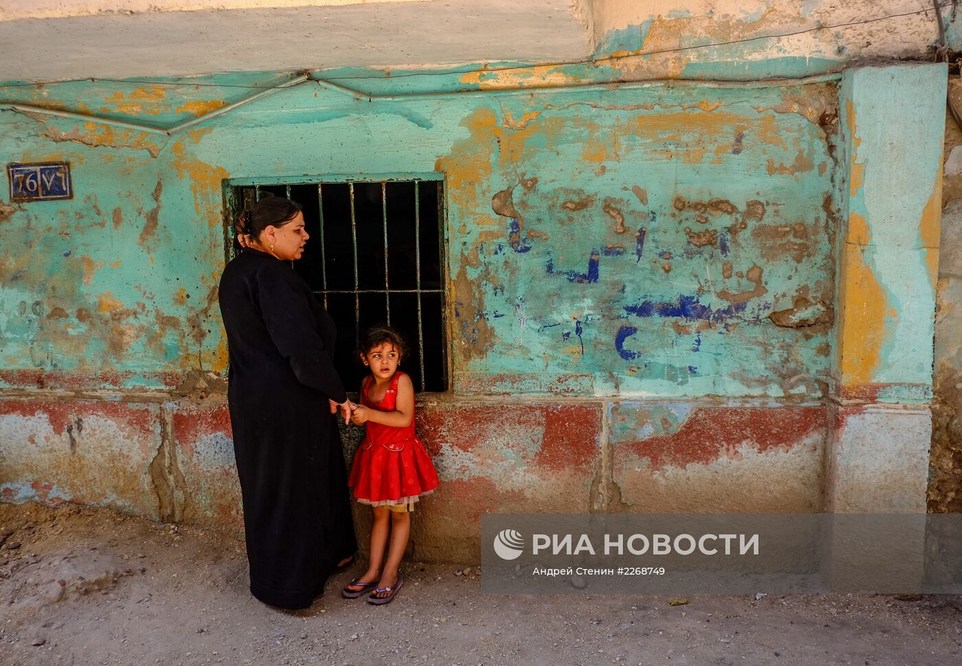 Коптская женщина с ребенком в Минье