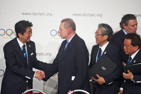 Церемония подписания контракта между Японией и МОК