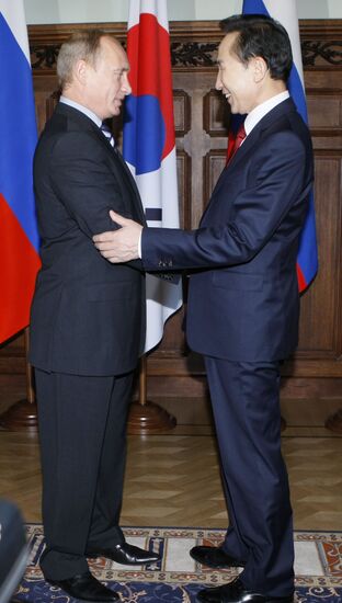 В.Путин, Ли Мен Бак