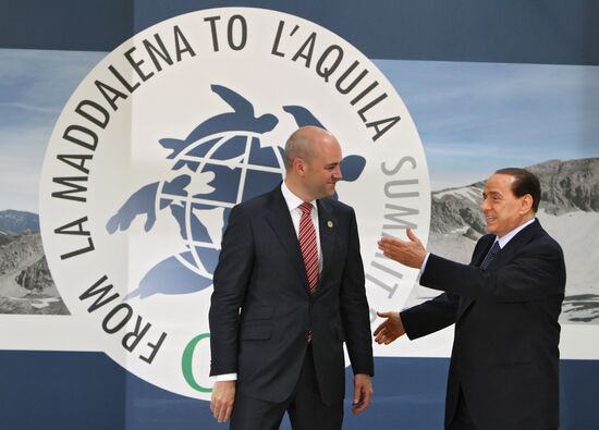 Ф.Рейнфельдт и С.Берлускони на саммите "большой восьмерки"-2009