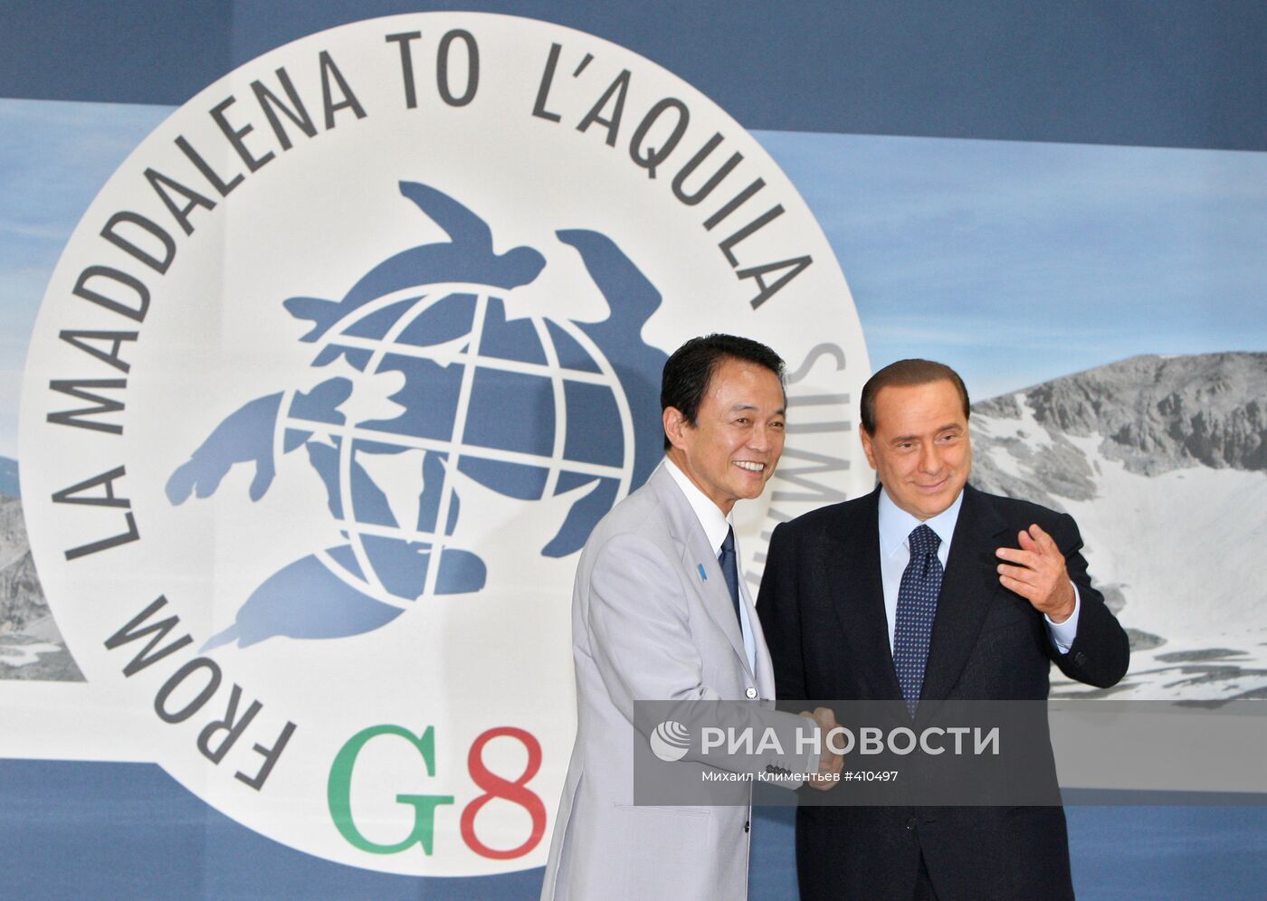 Таро Асо и С.Берлускони на саммите "большой восьмерки"-2009