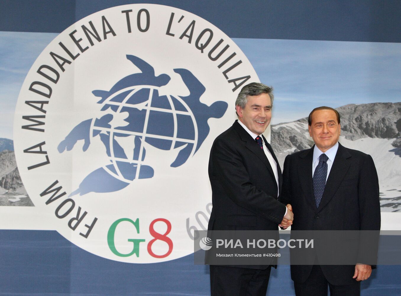 Гордон Браун и С.Берлускони на саммите "большой восьмерки"-2009