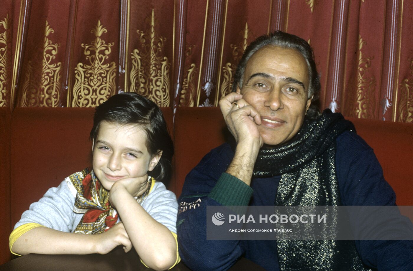 Николай Сличенко со своим внуком
