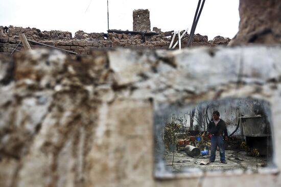 Разрушения в поселке Кыр-Арык