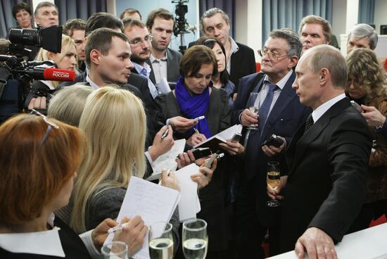 В.Путин поздравил журналистов с наступающим Новым годом