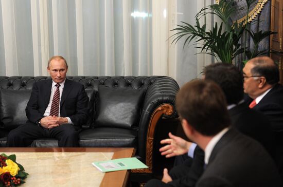 В.Путин встретился с Р.Айгером