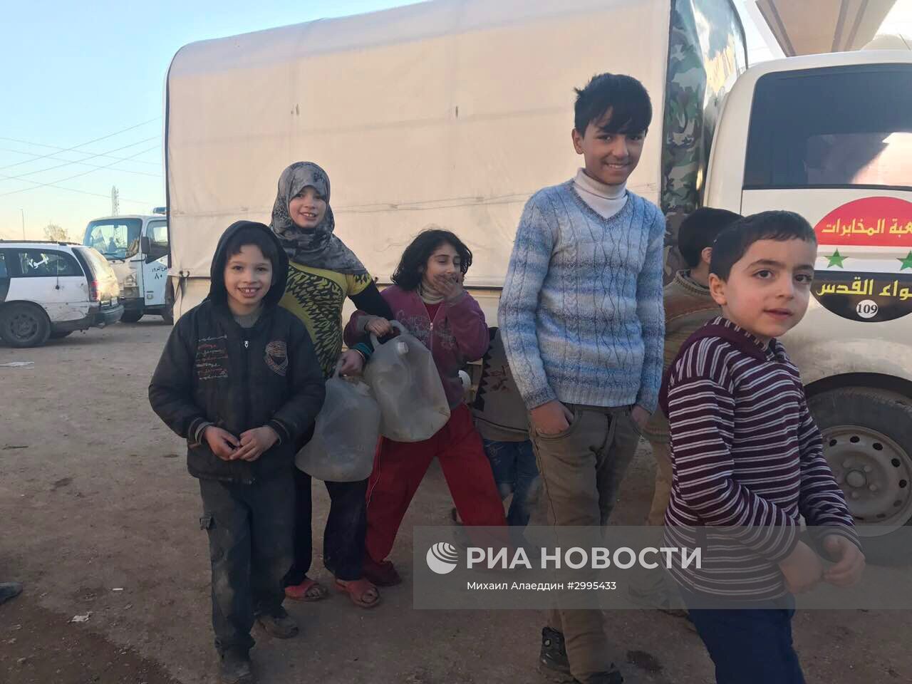 Жители Алеппо после вывода боевиков и членов их семей из восточного Алеппо