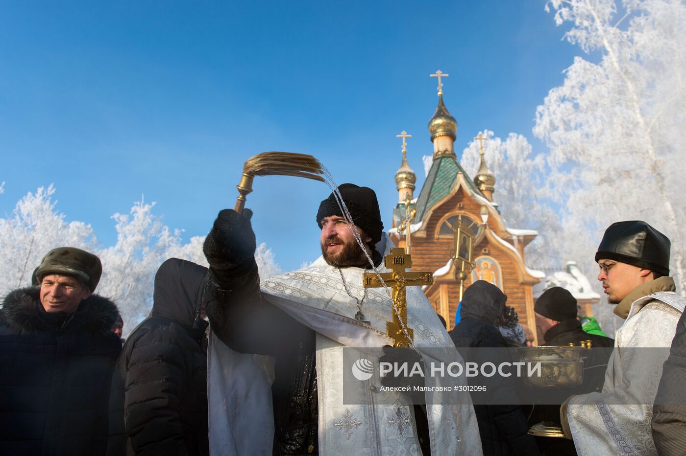 Празднование Крещения в городах России