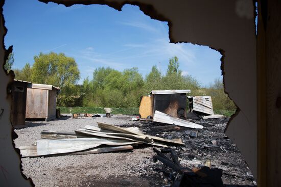 Последствия пожара в лагере мигрантов во Франции
