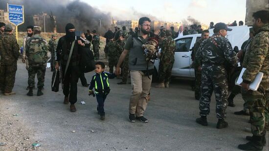 Последний этап вывода боевиков из квартала Аль-Ваэр в городе Хомс