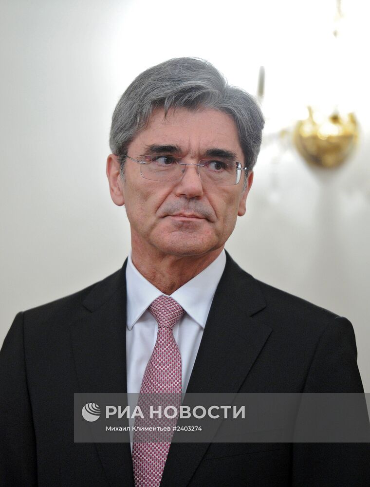 В.Путин провел рабочую встречу с Д.Кэзером