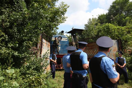 Поезд с телами жертв катастрофы малайзийского лайнера Boeing 777 прибыл в Харьков