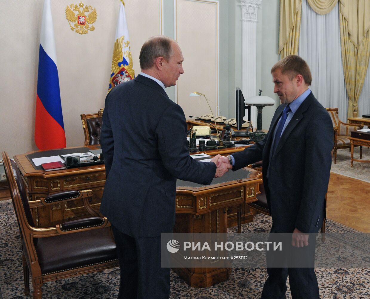 В.Путин провел рабочую встречу с А.Калининым