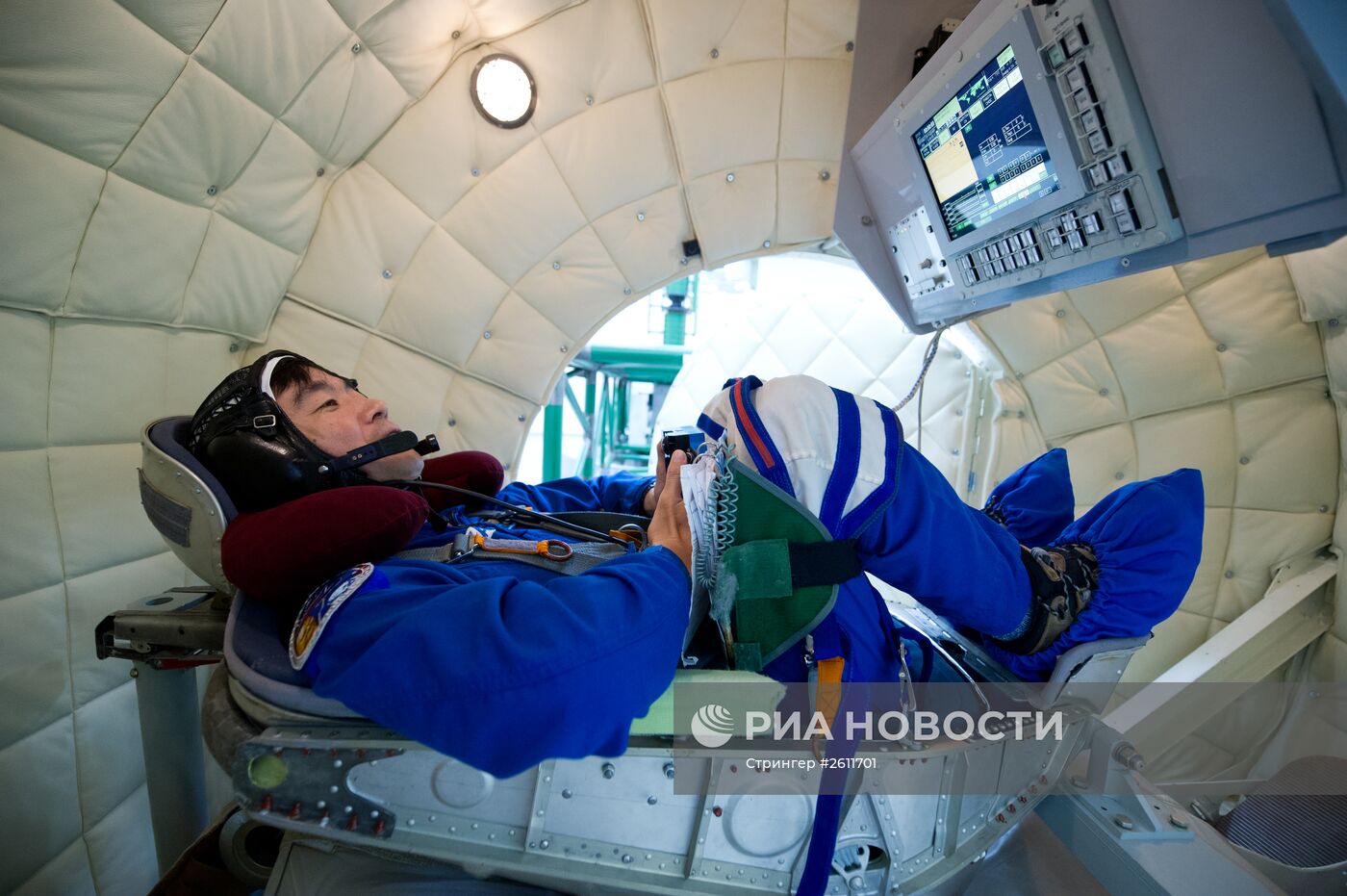 Тренировка космонавтов Олега Кононенко и Юи Кимия на центрифуге ЦФ-7