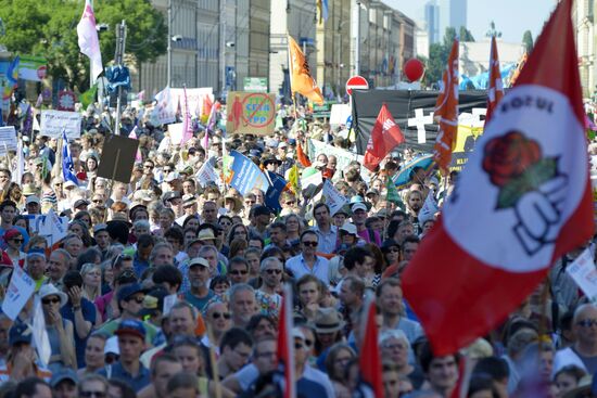 Акция протеста в Мюнхене, приуроченная к саммиту G-7