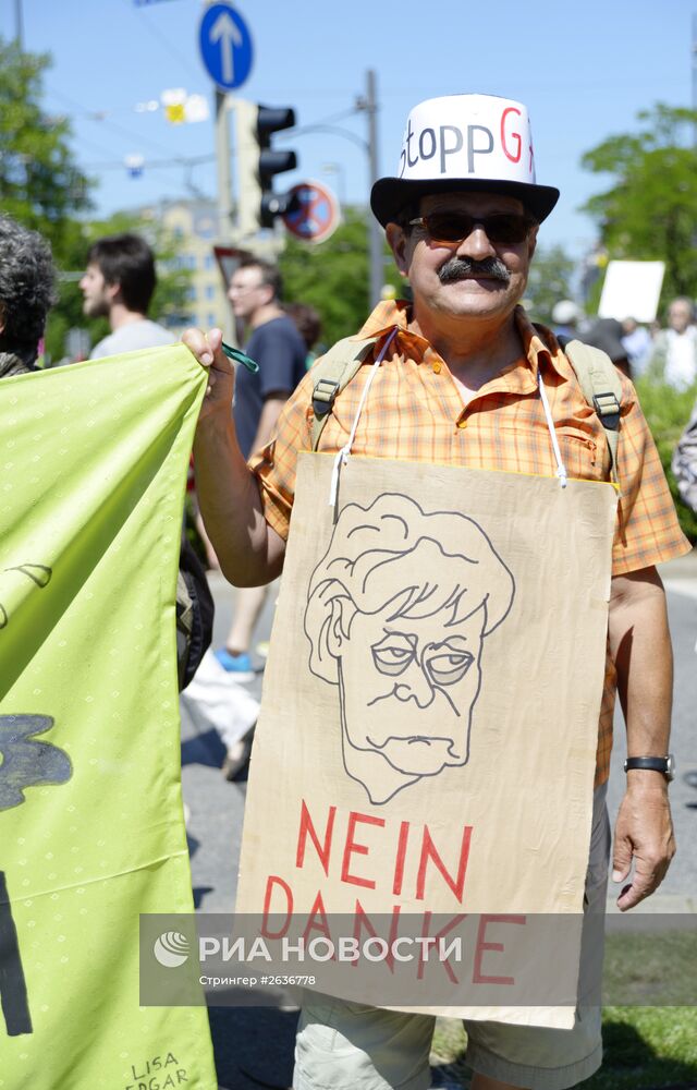 Акция протеста в Мюнхене, приуроченная к саммиту G-7