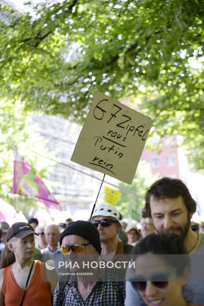 Акция протеста в Мюнхене, приуроченная к саммиту G-7