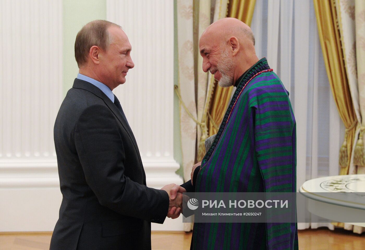 Президент РФ В.Путин встретился с экс-президентом Афганистана Х.Карзаем