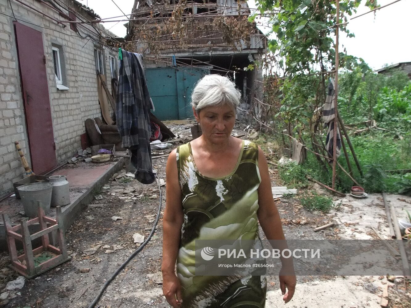 Последствия обстрела села Саханка в Донецкой области