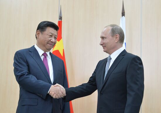 Беседа Президента Российской Федерации Владимира Путина с Председателем Китайской Народной Республики Си Цзиньпином