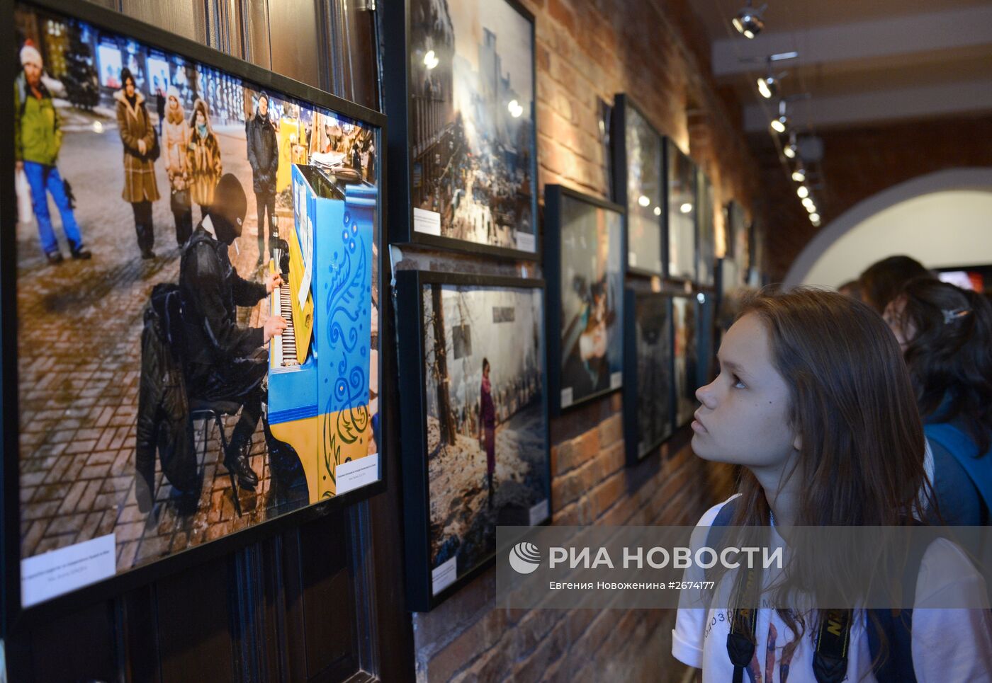 Открытие выставки фотокорреспондента МИА "Россия сегодня" Андрея Стенина