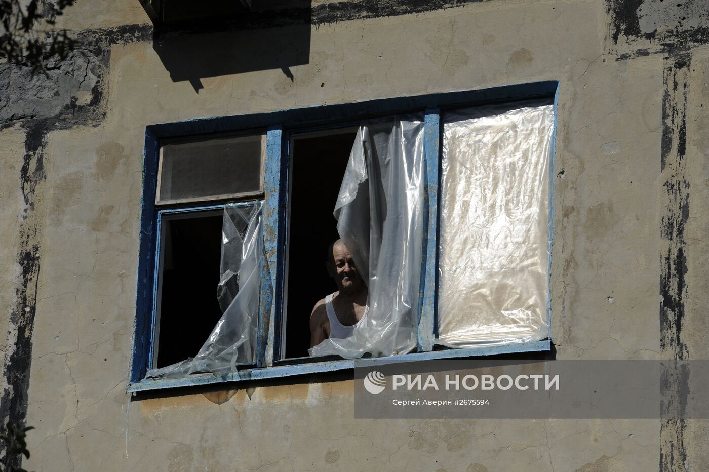 Последствия обстрела поселка Октябрьский в Донецкой области