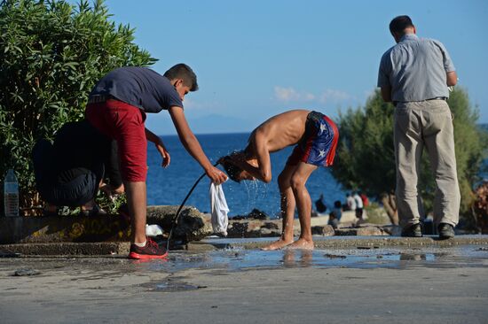 Мигранты с Ближнего Востока на острове Лесбос в Греции