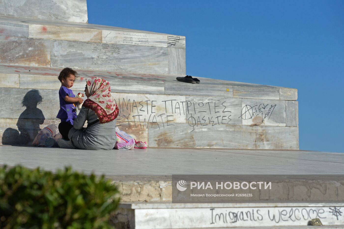 Мигранты с Ближнего Востока на острове Лесбос в Греции