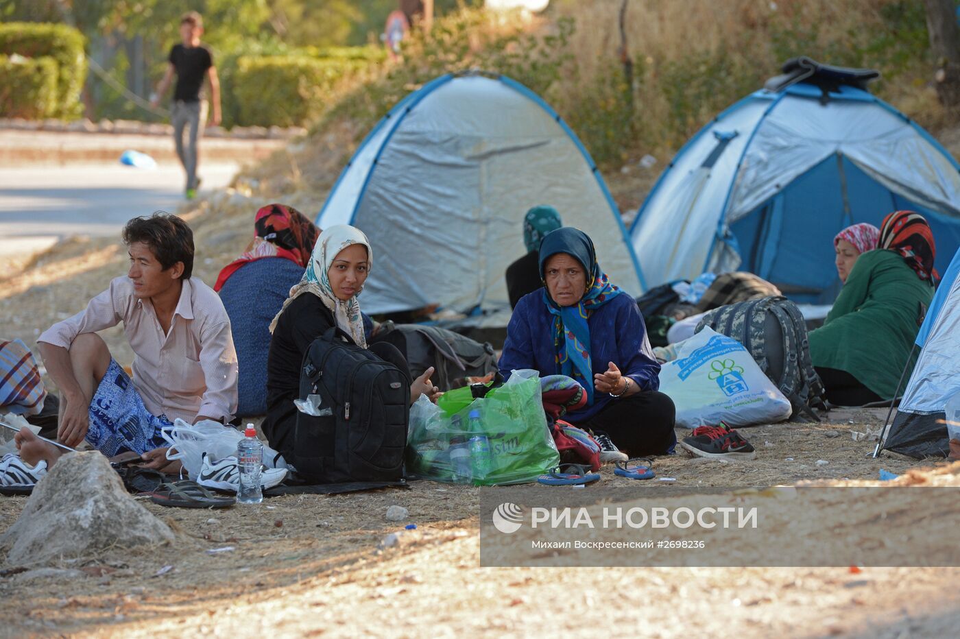 Мигранты с Ближнего Востока на острове Лесбос в Греции