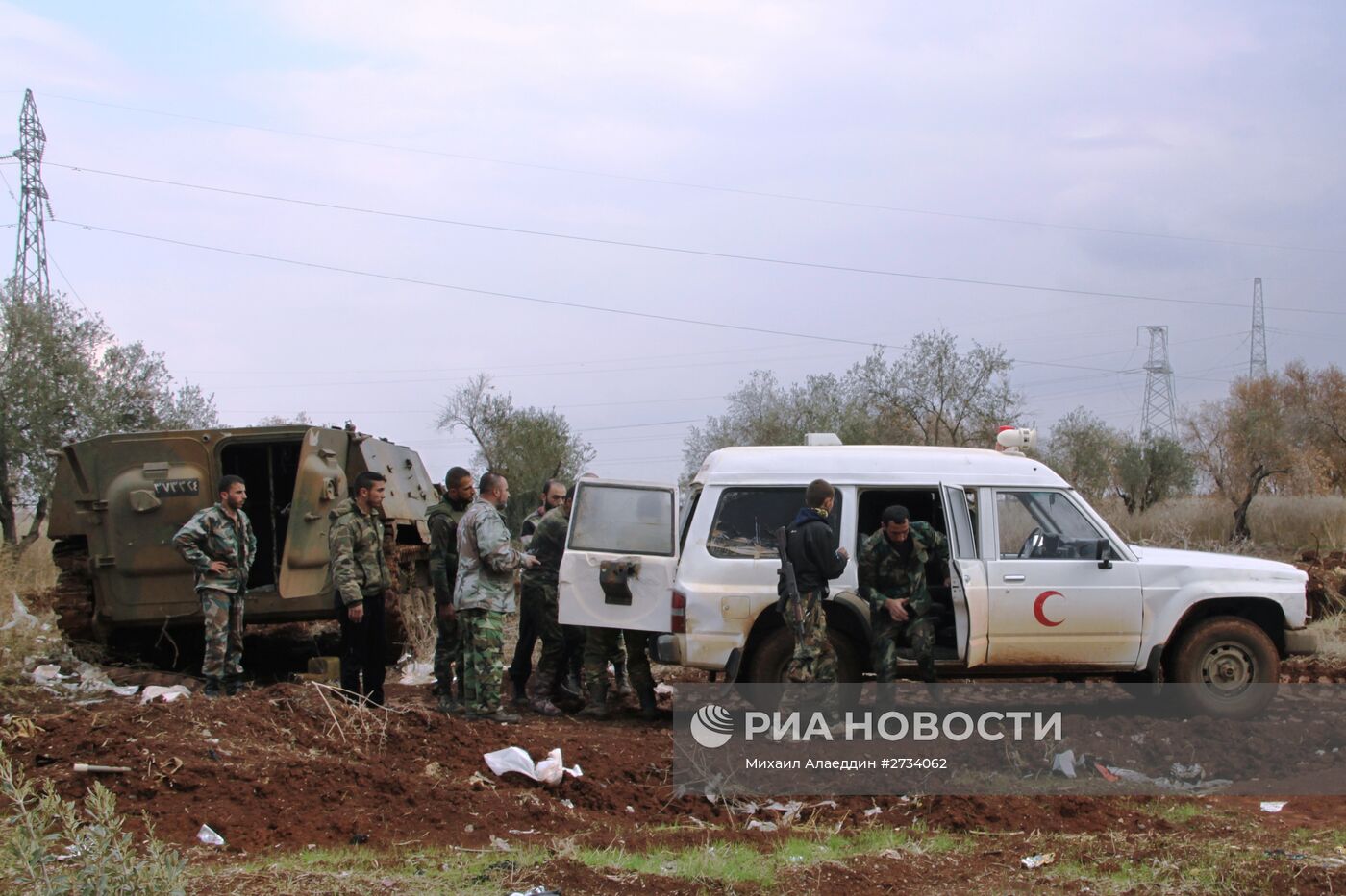 Бойцы сирийской армии на позициях в посёлке Шейх-Мискин