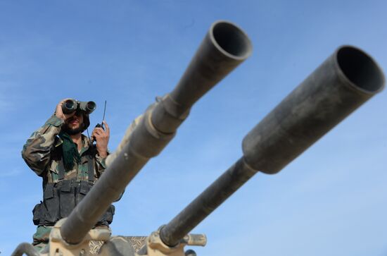 Сирийская армия полностью освободила от боевиков город Эль-Карьятейн