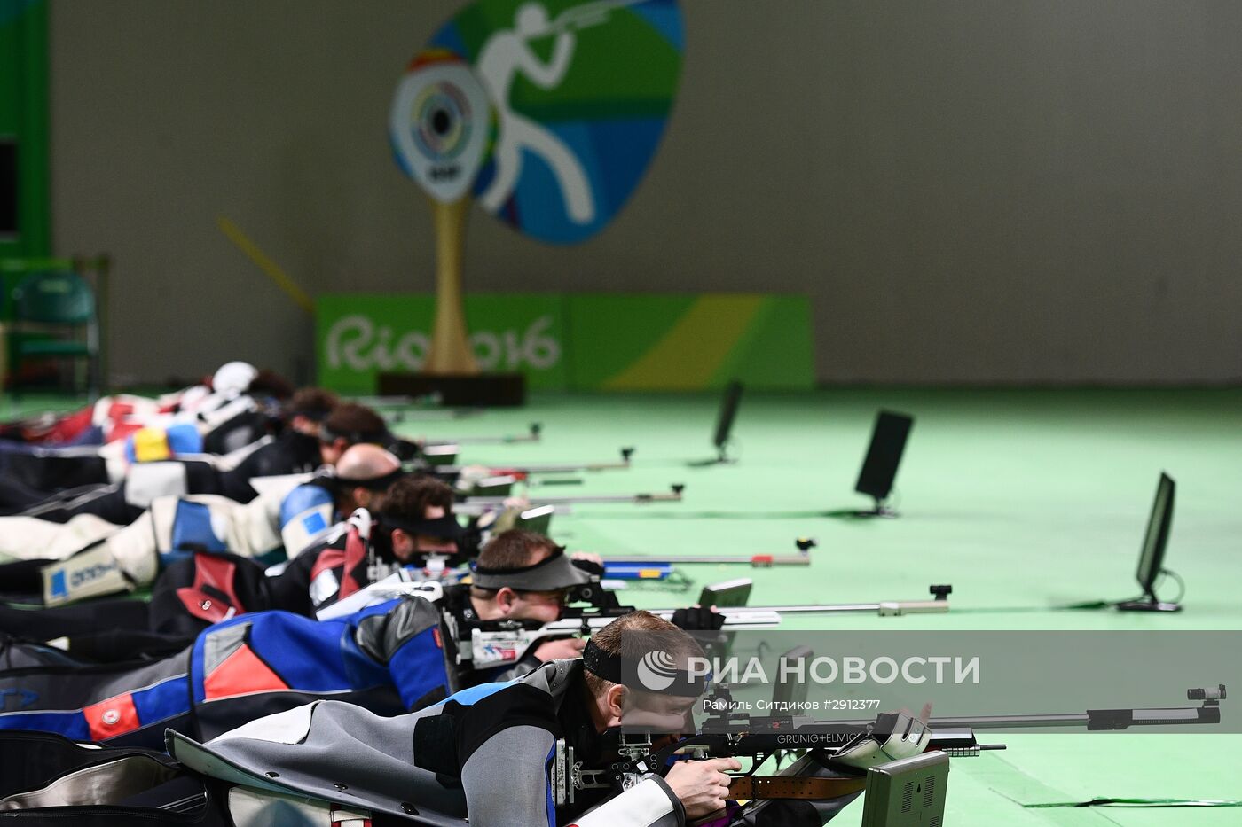Олимпийский вид спорта со стрельбой. Рио де Жанейро 2016 пулевая стрельба. Пулевая стрельба Олимпийские игры. Олимпийские игры по пулевой стрельбе. Стрельба из винтовки Олимпийский вид спорта.