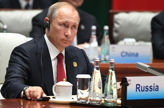 Президент РФ В. Путин на саммите лидеров БРИКС. День второй