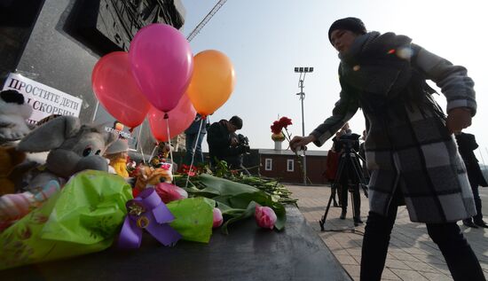 Акции в память о погибших при пожаре в ТЦ "Зимняя вишня"