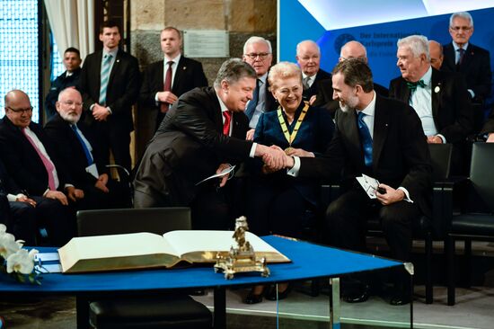 Встреча канцлера ФРГ А. Меркель, президента Франции Э. Макрона и президента Украины П. Порошенко