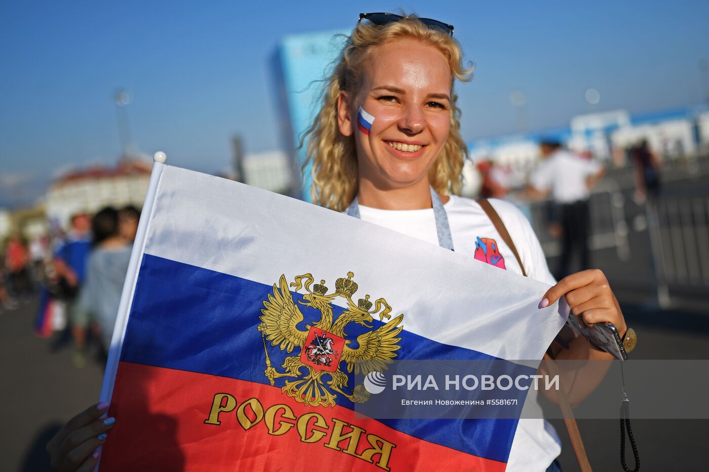 Болельщица сборной России перед матчем ЧМ-2018 по футболу между сборными России и Хорватии в Сочи. Место: Россия, Сочи. Автор: Евгения Новоженина/РИА Новости. Болельщики перед матчем ЧМ-2018 по футболу между сборными России и Хорватии
