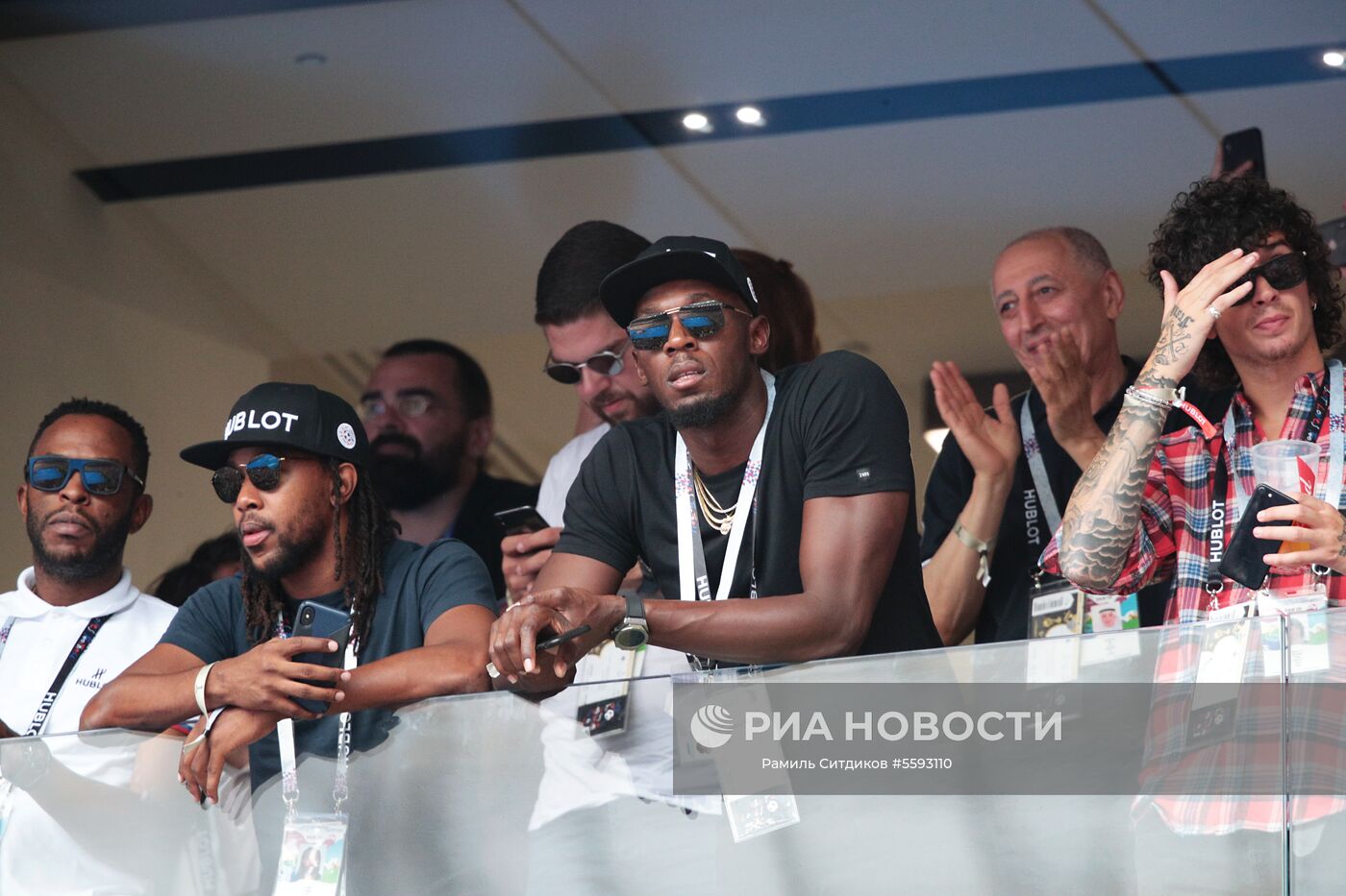 Ямайский легкоатлет, восьмикратный олимпийский чемпион Усэйн Болт (в центре) перед финальным матчем чемпионата мира по футболу между сборными Франции и Хорватии. Место: Россия, Москва. Автор: Рамиль Ситдиков/РИА Новости. Почетные гости финала ЧМ-2018 по футболу