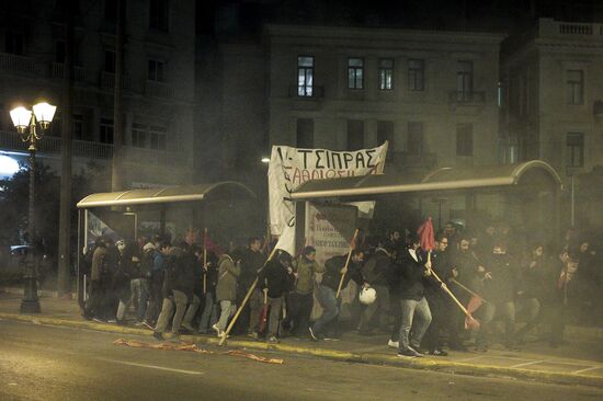Акция в Афинах против визита Ангелы Меркель