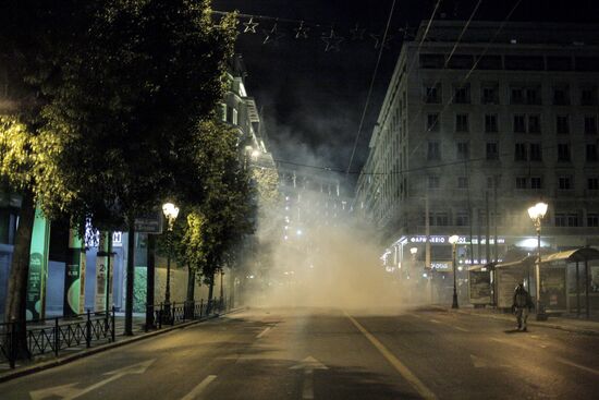 Акция в Афинах против визита Ангелы Меркель